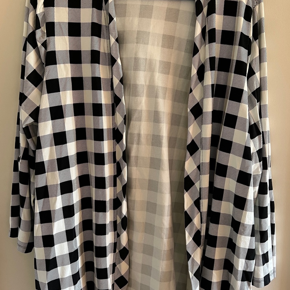 NWOT (never worn) Kim Rogers cardigan style lightweight cover up.